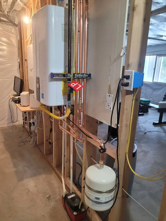 Licensed plumber repairing a kitchen sink in Flowood